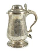 A George III silver tankard, with whistle? handle, by John King, of baluster form, with pierced