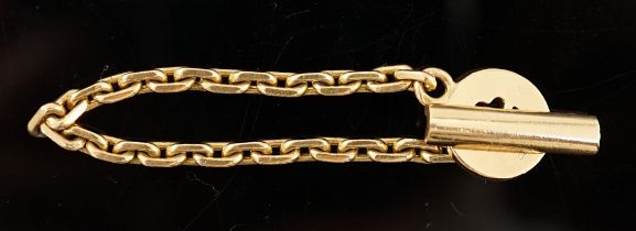 A French Cartier 18ct gold key chain, signed and indistinctly numbered 5cm, 8 grams, with Cartier