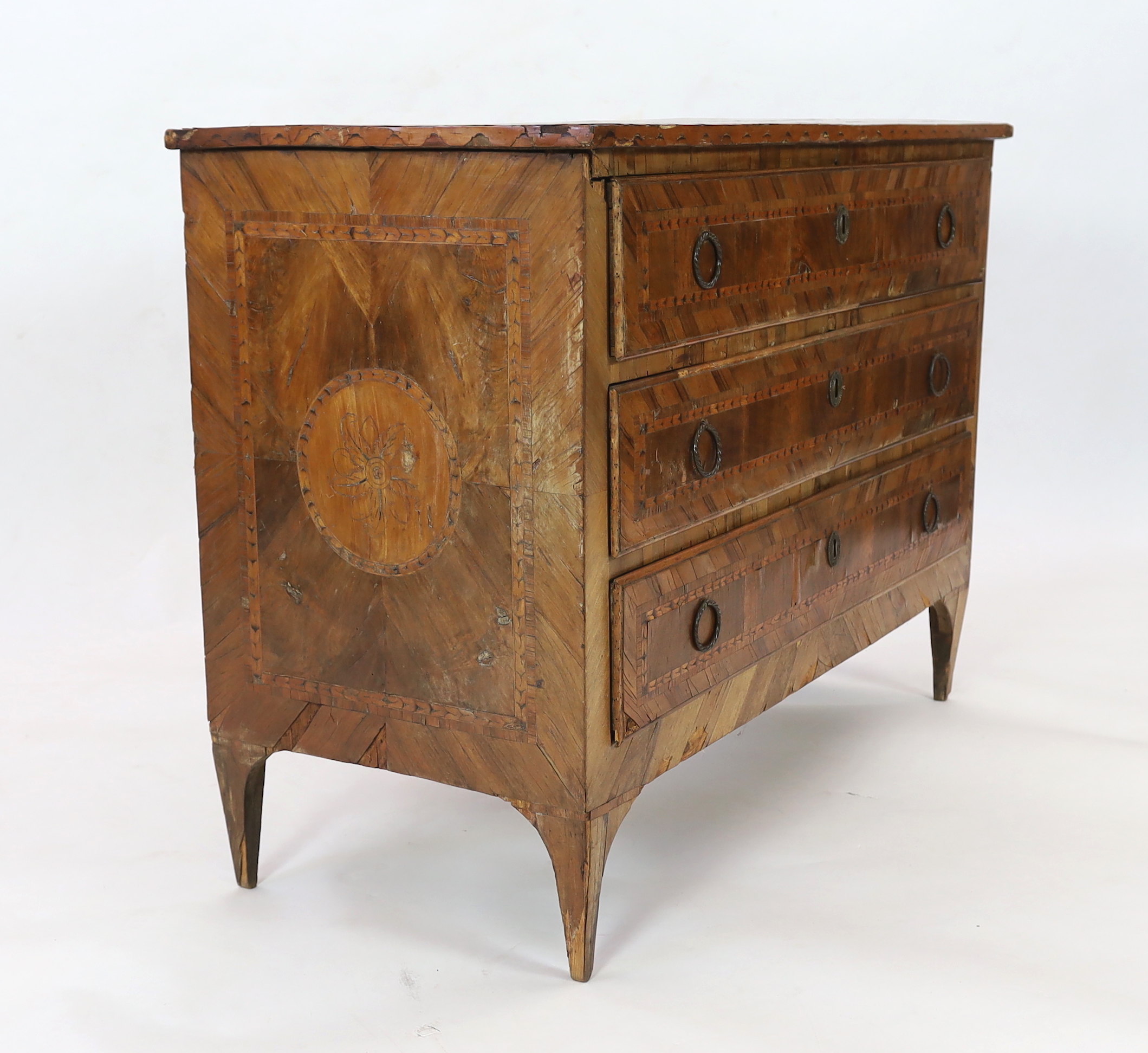 A late 18th century Italian olive wood and parquetry commode, fitted four long drawers on tapered - Image 4 of 4