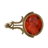 A late 18th/early 19th gilt metal mounted intaglio agate set swivelling fob seal, carved with the