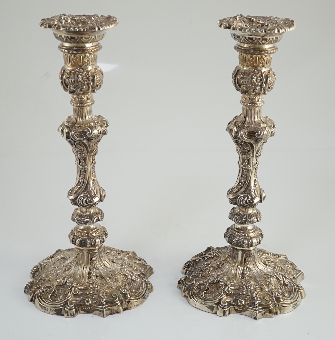 An ornate pair of Edwardian silver candlesticks, by Walker & Hall, with fixed sconces, waisted - Image 3 of 11