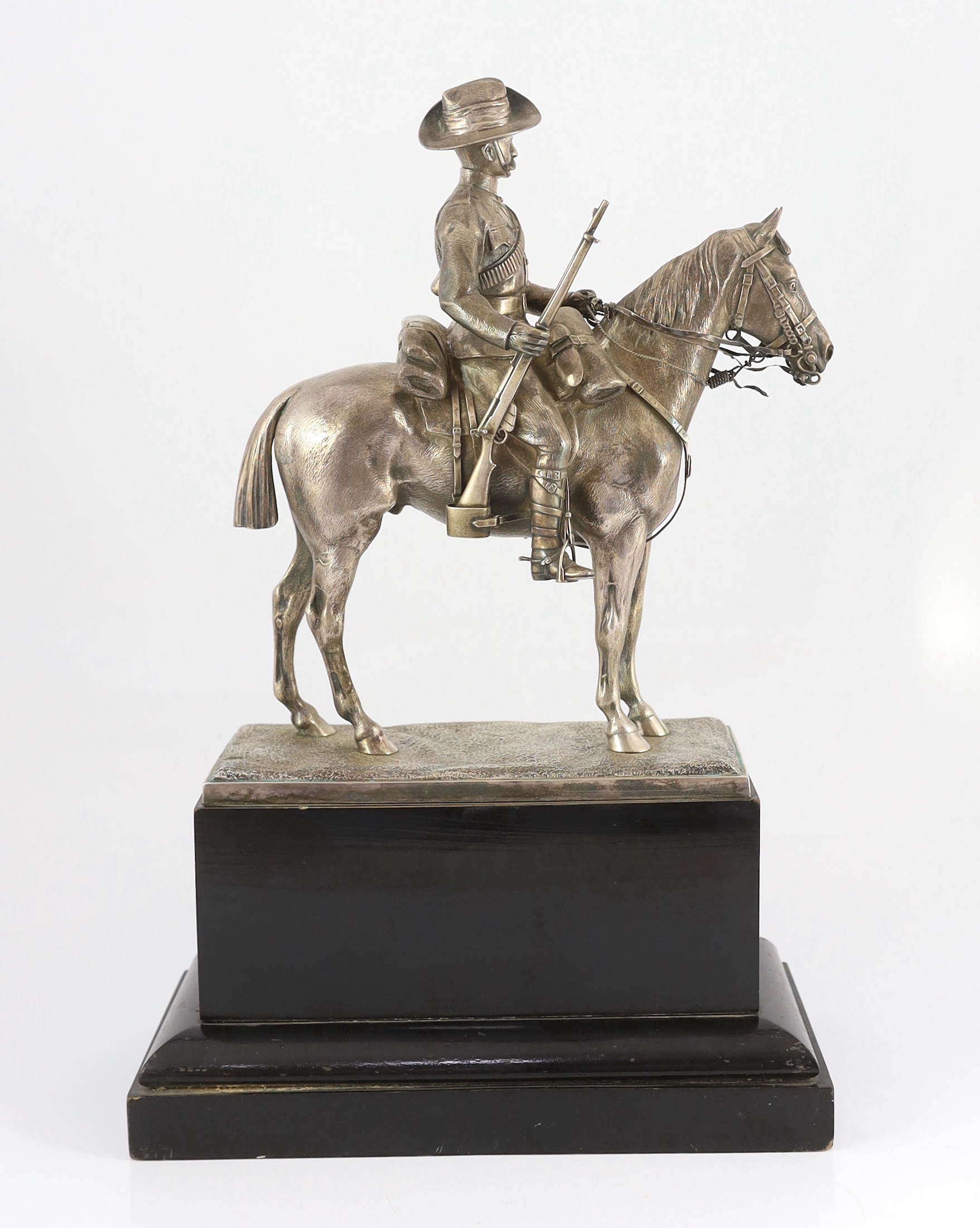 An early 20th century silver model of a City Imperial Volunteer, holding a rifle, on horseback - Image 6 of 7