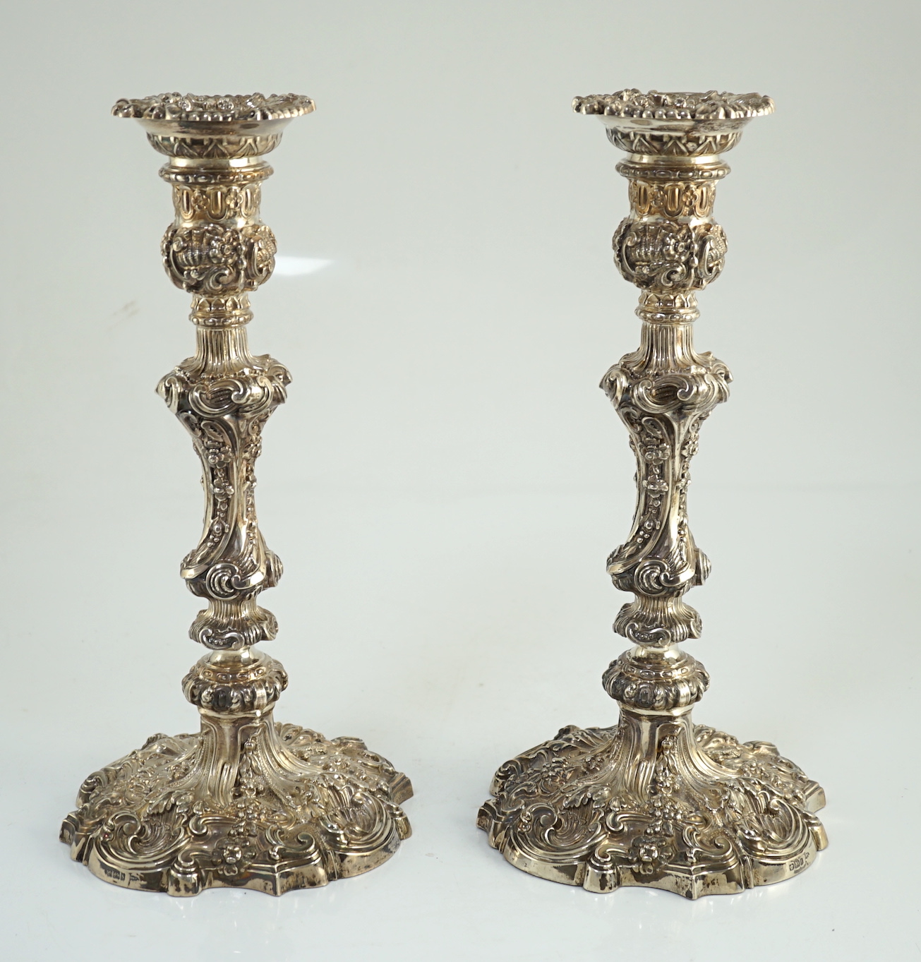 An ornate pair of Edwardian silver candlesticks, by Walker & Hall, with fixed sconces, waisted - Image 2 of 11