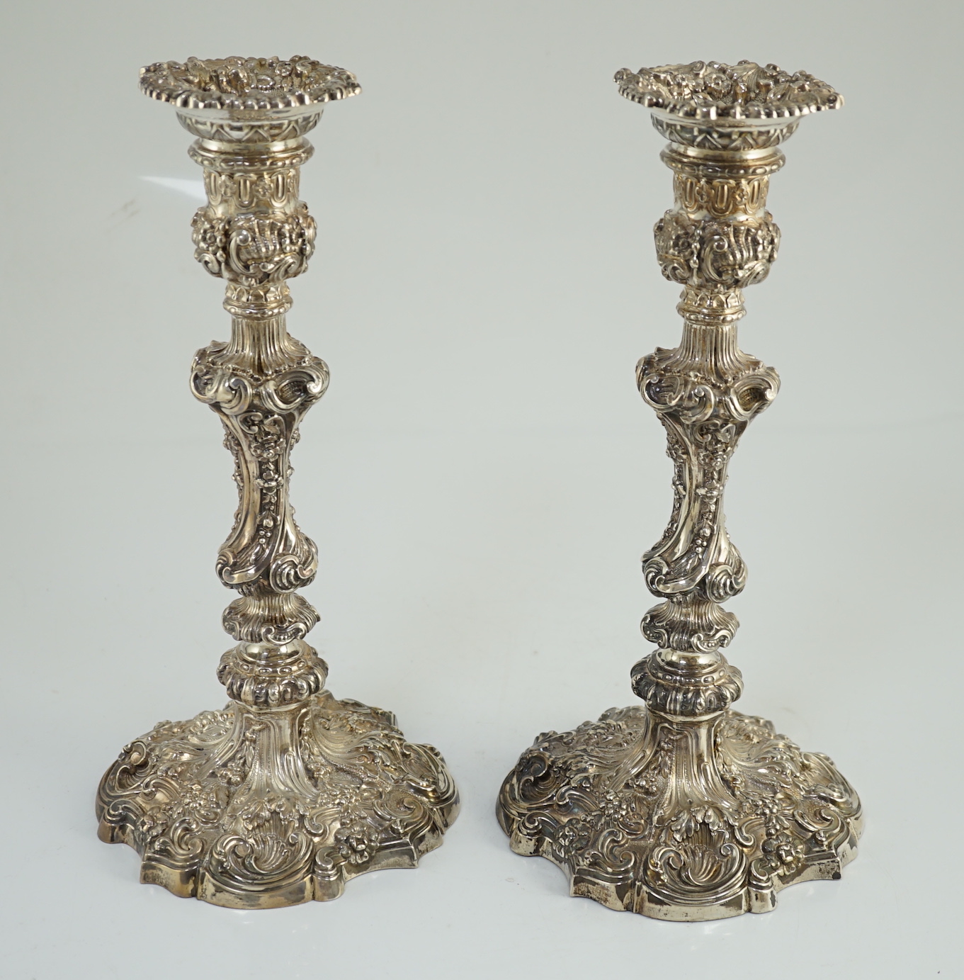 An ornate pair of Edwardian silver candlesticks, by Walker & Hall, with fixed sconces, waisted - Image 8 of 11