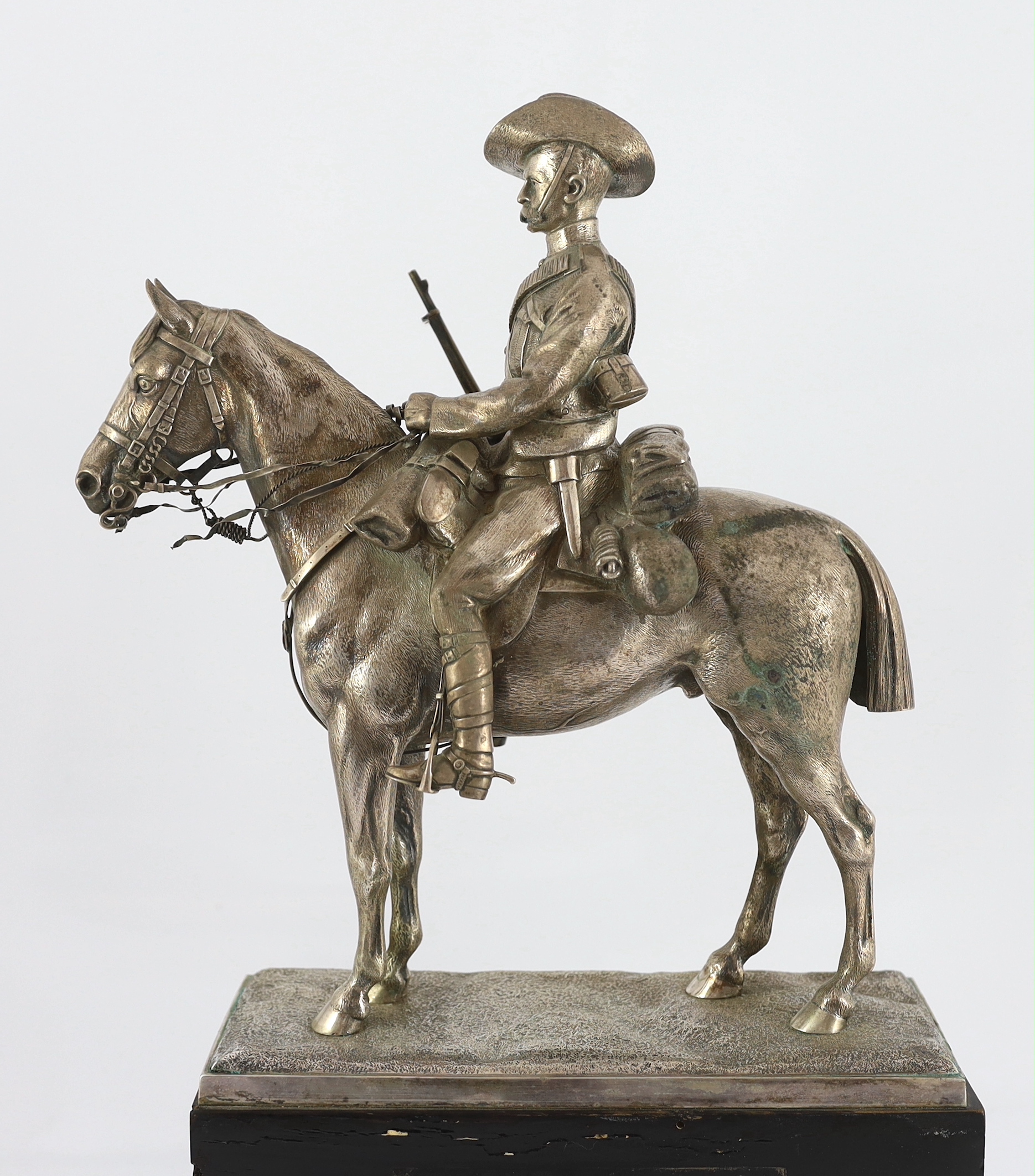 An early 20th century silver model of a City Imperial Volunteer, holding a rifle, on horseback - Image 2 of 7