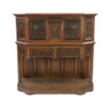 An antique oak dresser, based on a 15th century French gothic model and very similar to an example
