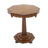 An early Victorian pollard oak occasional table with segmented octagonal top on tapered stem and