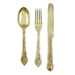 A Victorian and later matched silver gilt part canteen of dessert cutlery by Francis Higgins II &