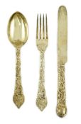 A Victorian and later matched silver gilt part canteen of dessert cutlery by Francis Higgins II &