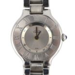 A lady's modern stainless steel Must de Cartier 21 quartz wrist watch, on a stainless steel