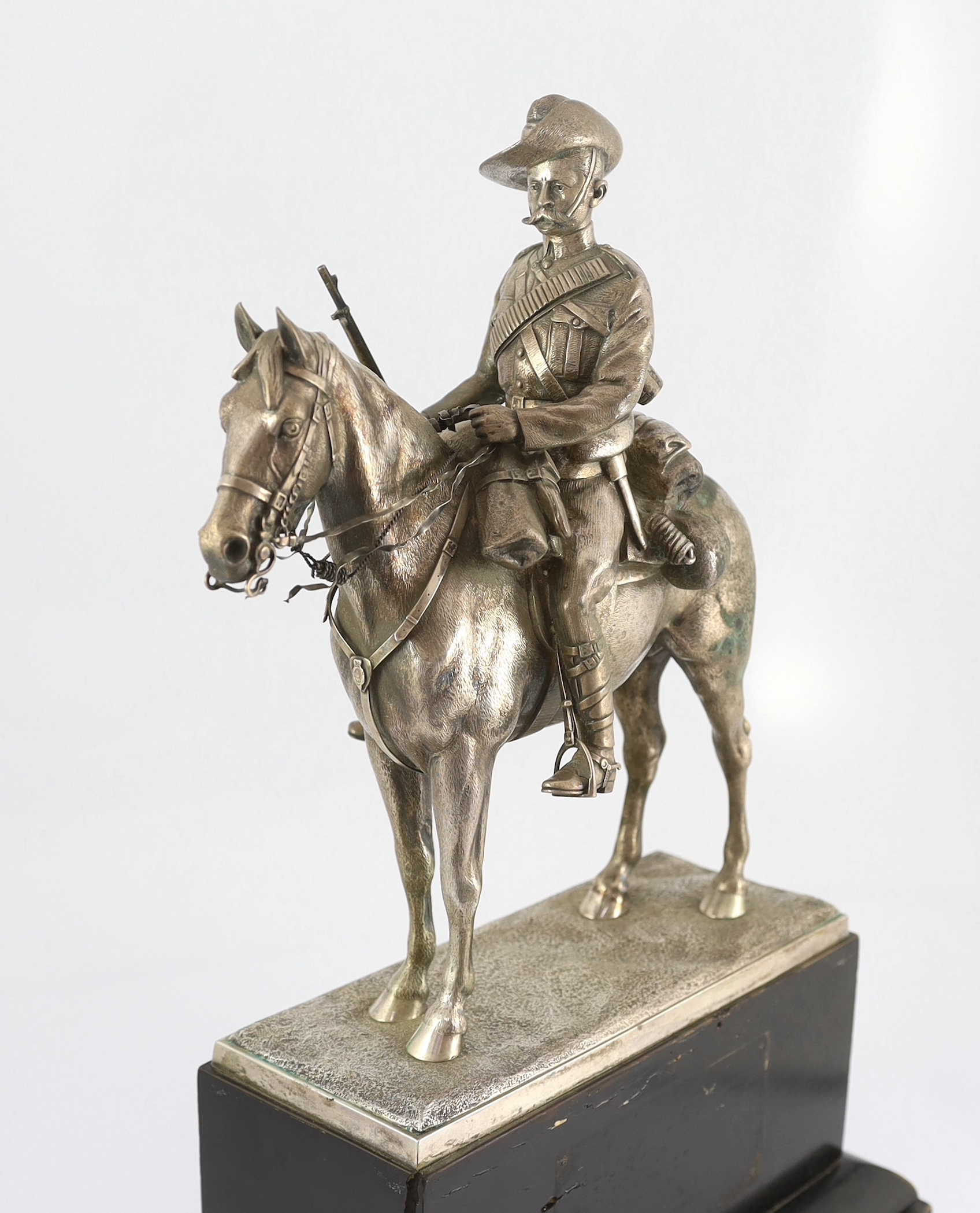 An early 20th century silver model of a City Imperial Volunteer, holding a rifle, on horseback - Image 3 of 7