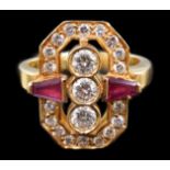 A modern gold, ruby and diamond cluster dress ring, of octagonal form and set with round brilliant