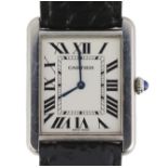 A gentleman's stainless steel Cartier rectangular quartz wrist watch, with Roman dial and cabochon