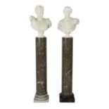 After the Antique. A pair of 19th century white marble busts of Apollo and Diana, on grey marble