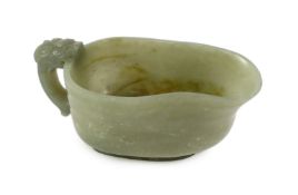 A Chinese celadon jade pouring vessel, yi, 17th/18th century, with incised keywork band below the