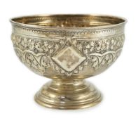 An Edwardian embossed silver rose bowl, by Walker & Hall, with embossed foliate band, Sheffield,