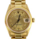 A lady's early 1970's 18ct gold Rolex Oyster Perpetual Datejust wrist watch, with diamond dot
