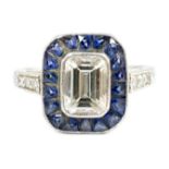 A 1920's platinum and millegrain set single stone emerald cut diamond and sapphire set rectangular