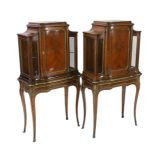 A pair of late 19th century Louis XVI style marquetry inlaid kingwood vitrines with ormolu mounts,