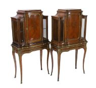 A pair of late 19th century Louis XVI style marquetry inlaid kingwood vitrines with ormolu mounts,