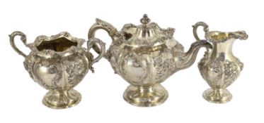 An early Victorian three piece Scottish silver inverted pear shaped tea set by Leonard Urquhart,
