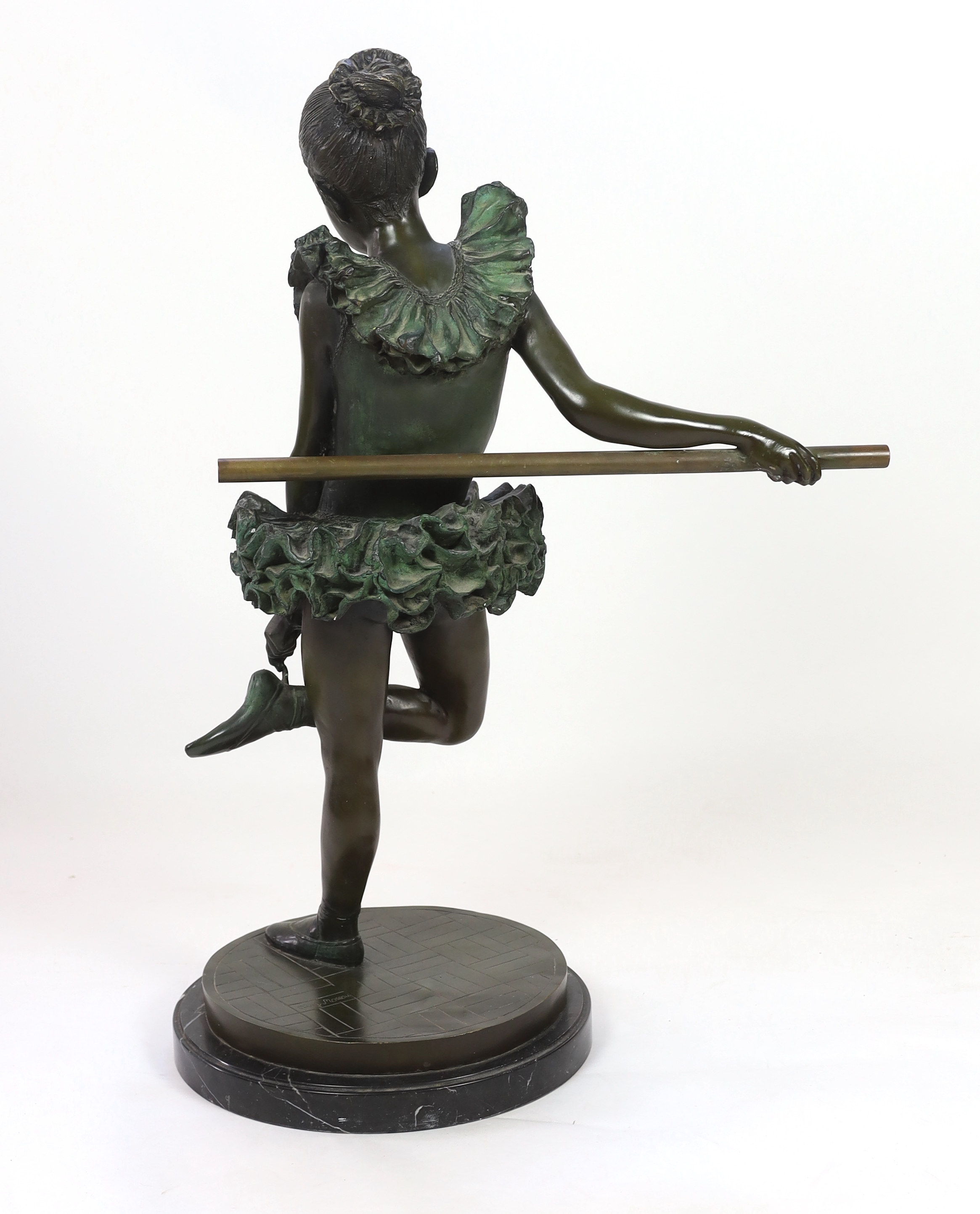 After Auguste Moreau (French, 1834-1917). A bronze figure of a ballerina, Standing leaning against a - Image 4 of 5