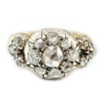 A Georgian gold, silver and rose cut diamond cluster set dress ring, with old round cut diamond