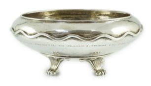 A George V Omar Ramsden planished silver shallow bowl, with wavy banded girdle engraved