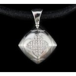 A modern Italian Bulgari 18ct white gold and pave set diamond pendant, on a Bulgari 18ct white