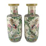 A pair of large Chinese crackle glaze famille rose ‘Hundred Bird’ rouleau vases, late 19th