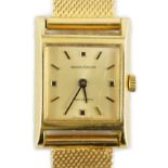 A lady's 18ct gold Jaeger LeCoultre Voguematic automatic rectangular wrist watch, on an associated