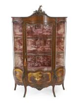 A Vernis Martin style rosewood vitrine with ormolu mounts and single serpentine door, decorated with