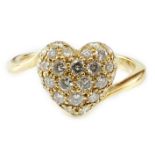 A modern Cartier 18ct gold and pave set diamond heart shaped ring, signed and numbered D58987 51,