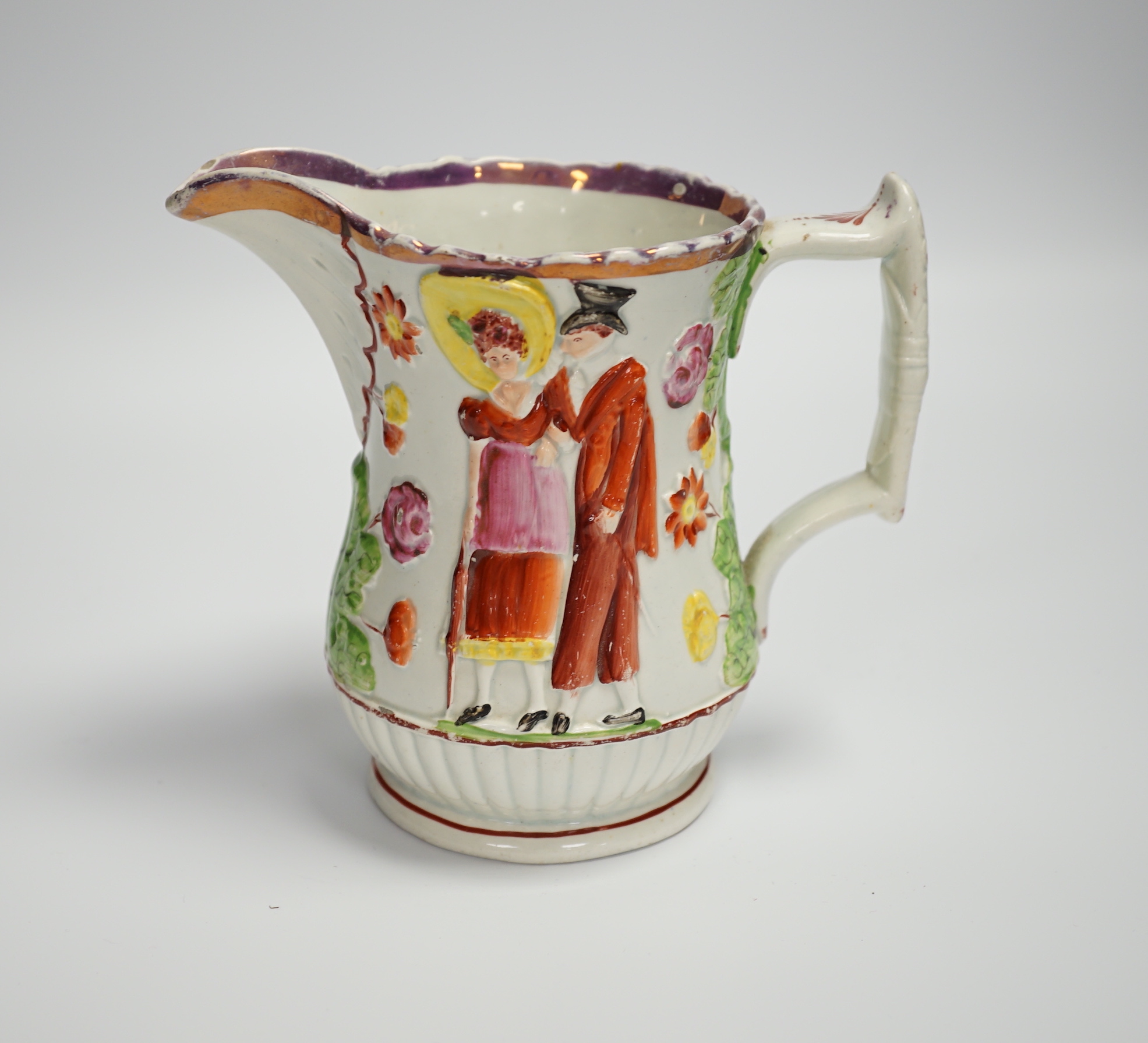 A relief moulded 19th century Staffordshire pearlware jug, 15cm high***CONDITION REPORT***PLEASE