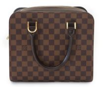 A Louis Vuitton Triana handbag, styled in Damier canvas with plain chocolate canvas trim and gold