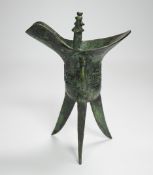 A Chinese bronze archaistic tripod Jue cup (ex. late prof. R.M. Hicks OBE), 18cm***CONDITION