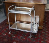A mid century French mirrored two tiered drinks trolley, width 72cm, depth 40cm, height 72cm***