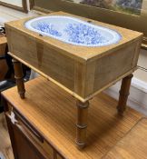 A 19th century French faux bamboo rectangular bidet with blue and white ceramic liner, width 52cm,
