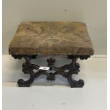 A Victorian carved and upholstered rectangular 'X' framed oak dressing stool, width 56cm, depth
