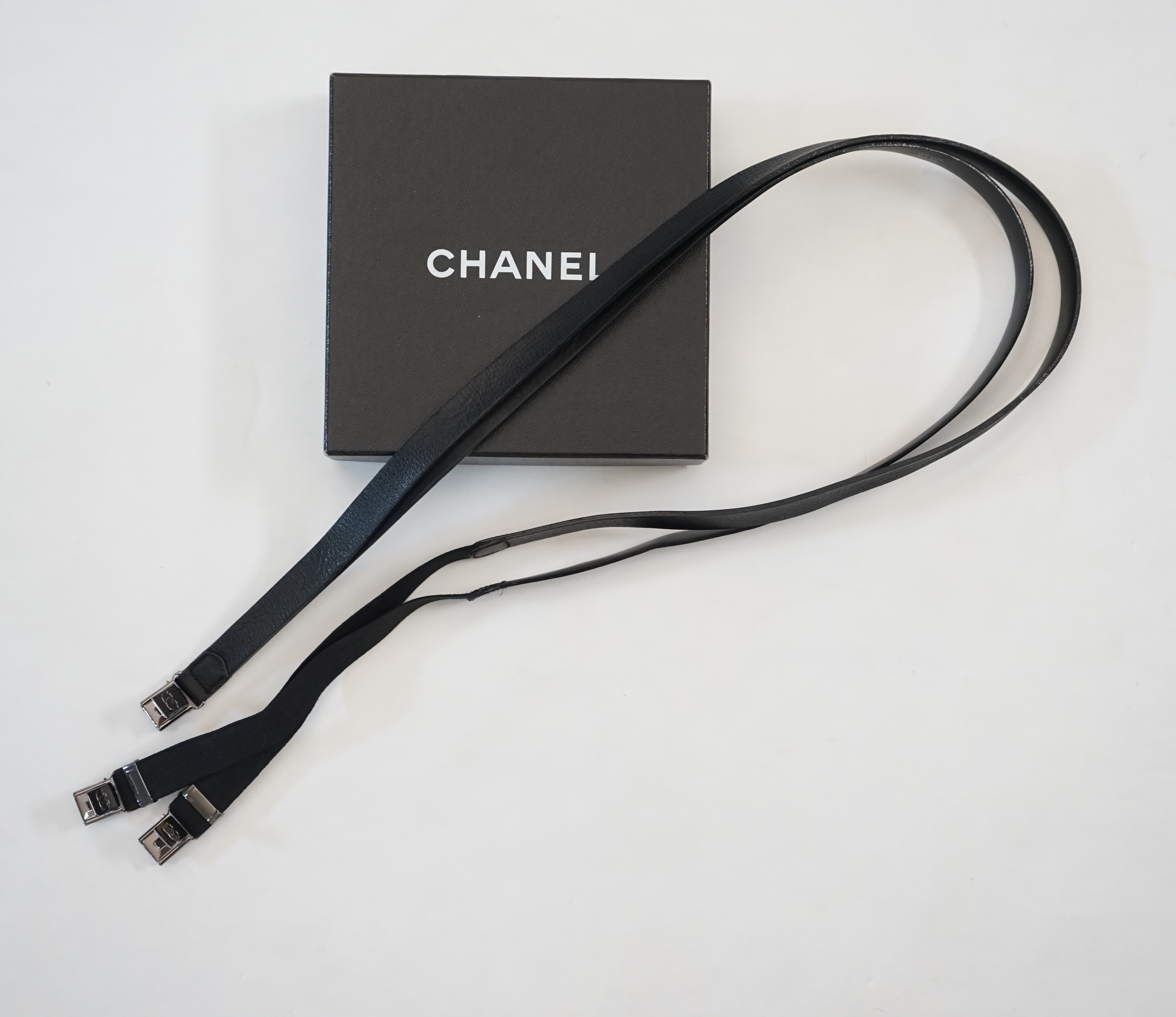 A pair of Chanel black leather one sided braces, boxed***CONDITION REPORT***Good condition, no - Image 2 of 6