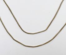 A 19th century yellow metal twin strand guard chain, 80cm, 16.8 grams.***CONDITION REPORT***PLEASE