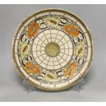 A Charlotte Rhead charger, 31.5cm diameter***CONDITION REPORT***PLEASE NOTE:- Prospective buyers are