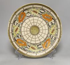A Charlotte Rhead charger, 31.5cm diameter***CONDITION REPORT***PLEASE NOTE:- Prospective buyers are