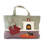 A Radley 'Armchair, Fireplace' leather grab handle bag, with armchair, fireplace and Scottie dog