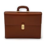 A gentlemen's Loewe brown tan leather briefcase with gold plated metalware, five division interior