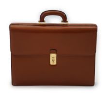 A gentlemen's Loewe brown tan leather briefcase with gold plated metalware, five division interior