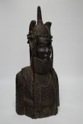 A heavy African ebony carved bust of a warrior, in Benin style, 48cm high***CONDITION REPORT***