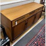 A mid century G Plan teak sideboard, length 142cm, depth 44cm, height 76cm***CONDITION REPORT***