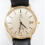 A gentleman's yellow metal Omega Seamaster De Ville manual wind wrist watch, on associated leather