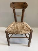 An Arts and Crafts style rush seat hardwood side chair, width 46cm, height 80cm***CONDITION